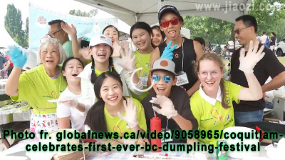 Jiaozi.com volunteers wave at Glbal News reporter / camera